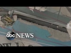 Read more about the article Teachers, students clear debris after missile hits school in Ukraine