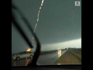 Read more about the article Storm chaser captures moment lightning strikes car in Iowa
