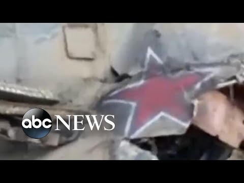 You are currently viewing Downed Russian helicopter pulled from Kyiv reservoir