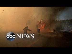Read more about the article Wildfires rage, inflation protests, a fountain of relief: World in Photos, July 21