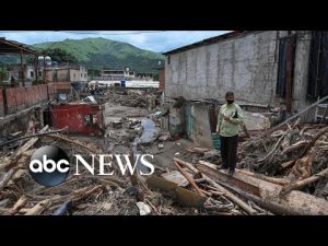 Read more about the article Venezuela floods, Sandy Hook jury decision, colorful trees: World in Photos, Oct. 13