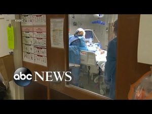 Read more about the article Virus surge overwhelms hospitals across the country