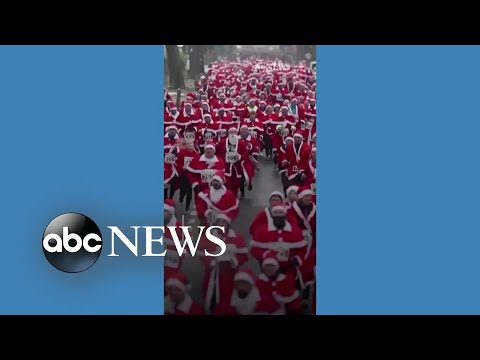 You are currently viewing Hundreds of Santas race in German town for annual fun run