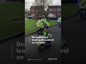Read more about the article Bereaved boy leads police patrol on toy bike