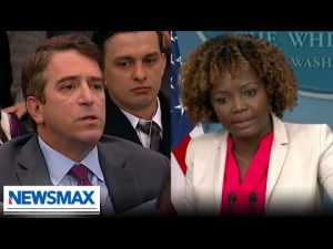 Read more about the article NEWSMAX correspondent GRILLS KJP over Biden not going to police funerals