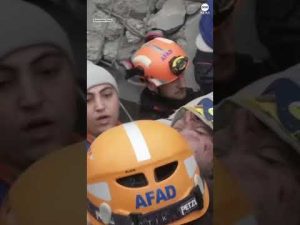 Read more about the article Emergency workers pull a man from the rubble of a collapsed building in Turkey after earthquake