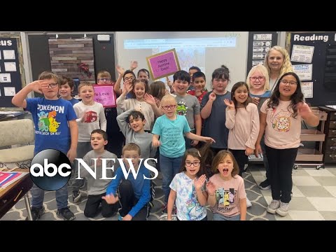 You are currently viewing 2nd graders celebrate classmate’s adoption with matching signs,t-shirts