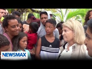 Read more about the article WATCH: Migrants from South America risk lives to get to America | The Record