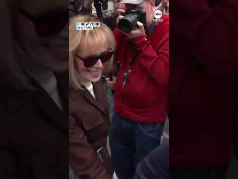 You are currently viewing E. Jean Carroll and her attorney leave court after a jury awarded her damages in Trump suit.