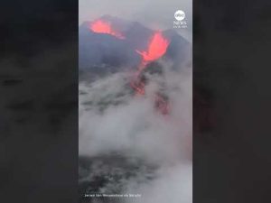 Read more about the article Lava flows against rainy backdrop in Iceland