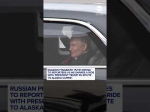 Read more about the article Putin waves to reporters as he shares a ride with Trump