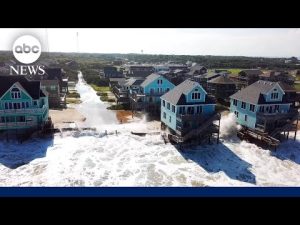 Read more about the article Cape Hatteras Motel surrounded by Hurricane Erin storm surge in the Outer Banks