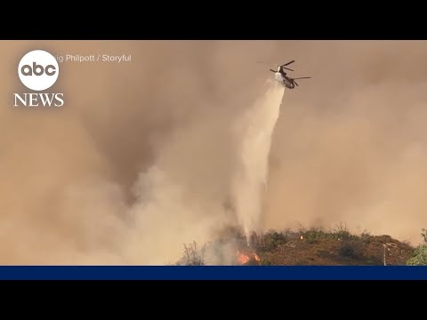 Read more about the article Firefighters battle raging fires and dangerous heat