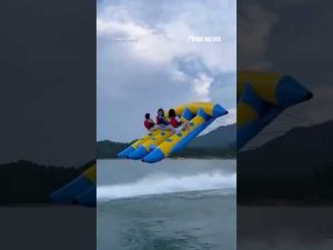 Read more about the article WATCH: Banana boat ride goes airborne, launches riders into lake #shorts #news #world #foxnews