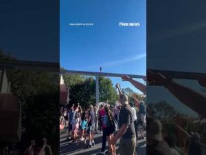 Read more about the article WATCH: Man rescues boy walking on monorail track #shorts