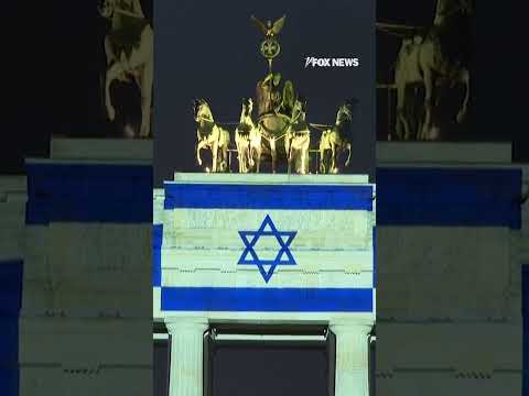 Read more about the article TOUCHING TRIBUTE: Berlin’s iconic Brandenburg Gate glowed with the Israeli flag #shorts #israel #fox