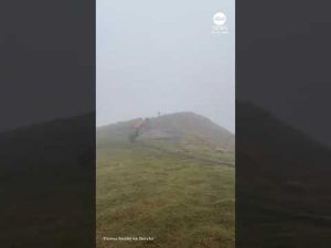 Read more about the article Man struggles to stay upright as powerful winds hit France
