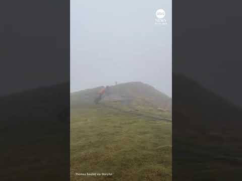 You are currently viewing Man struggles to stay upright as powerful winds hit France