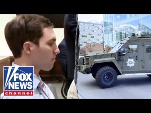 Read more about the article JUST IN: ‘Intense’ security seen as Charlie Kirk murder suspect appears in court