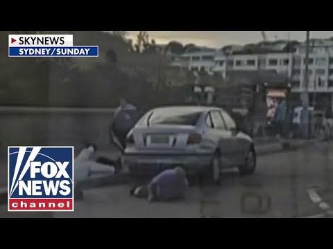 You are currently viewing JARRING footage shows civilians trying to disarm Australia terror suspects