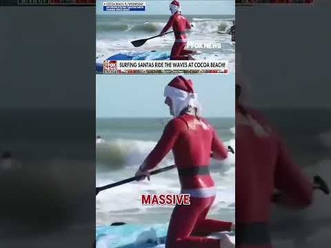 You are currently viewing Hundreds of surfing Santas ride the waves in Cocoa Beach #shorts