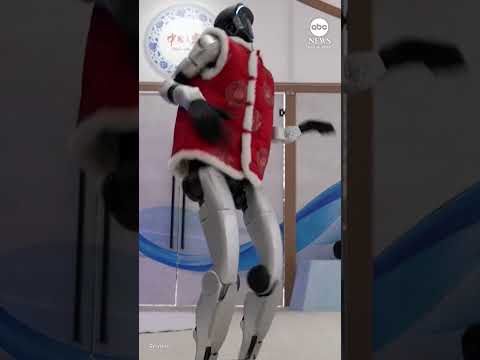 Read more about the article Robot at Chinese National Olympic Committee’s team house entertains visitors