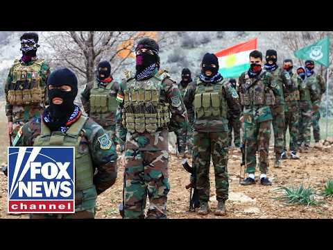 You are currently viewing Kurdish fighters watch for opening to strike Iran as Trump voices support