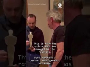 Read more about the article Ukraine official presents Sean Penn with Oscar-shaped award made from damaged railcar