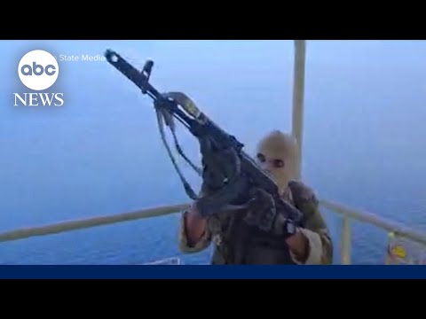 Read more about the article Iranian state TV airs video of masked gunmen boarding ship near Strait of Hormuz