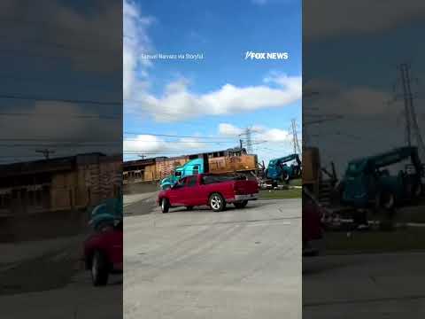 Read more about the article WATCH: Semi-truck gets stuck on the tracks—and the train is already coming… #shorts #viral #news