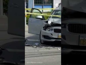 Read more about the article Motorcycle hangs from traffic light after crash