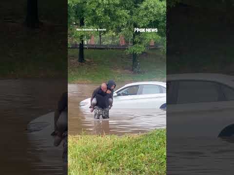You are currently viewing WATCH: Good Samaritan rescues woman stranded on top of her submerged car #usa #shorts #flood