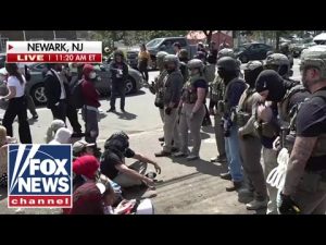 Read more about the article WATCH: Protesters CLASH with federal agents outside NJ facility
