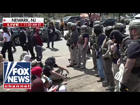 Read more about the article WATCH: Protesters CLASH with federal agents outside NJ facility