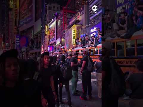 Read more about the article Fans scale buses in Times Square after Knicks win NBA title