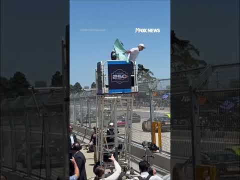 Read more about the article Hegseth waves green flag during NASCAR Cup Series race #foxnews #news #shorts #military #racing