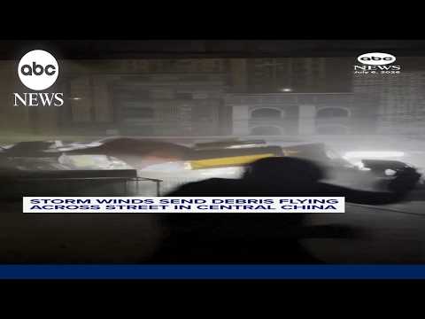 Read more about the article Powerful winds send debris flying down street in China