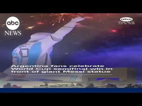 You are currently viewing Argentina fans celebrate win over England in front of big Messi statue