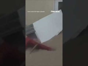 Read more about the article Man airlifted to safety as DEADLY Texas floodwaters swallow building