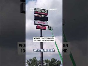 Read more about the article Worker rescued after being TRAPPED in sign 130 feet above ground #shorts #us #news