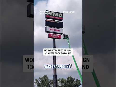 Read more about the article Worker rescued after being TRAPPED in sign 130 feet above ground #shorts #us #news
