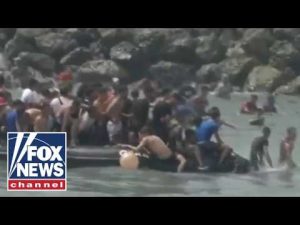 Read more about the article BREAKING: Migrants storm city border as national emergency requested
