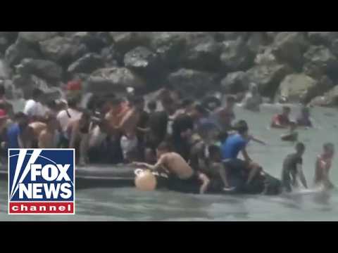 Read more about the article BREAKING: Migrants storm city border as national emergency requested
