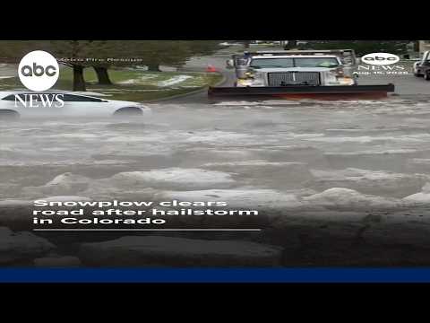 You are currently viewing Snowplow clears road after hailstorm in Colorado