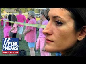 Read more about the article HUNDREDS rally in support of mom accused of murdering her children