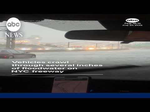 You are currently viewing Vehicles crawl through several inches of floodwater on NYC freeway
